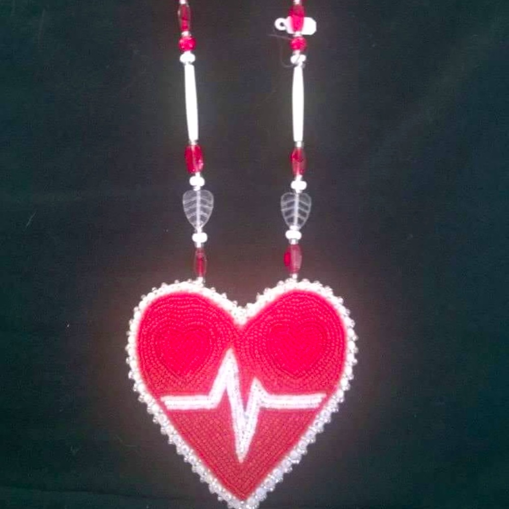 Handmade beadwork Native American traditional heart medallion